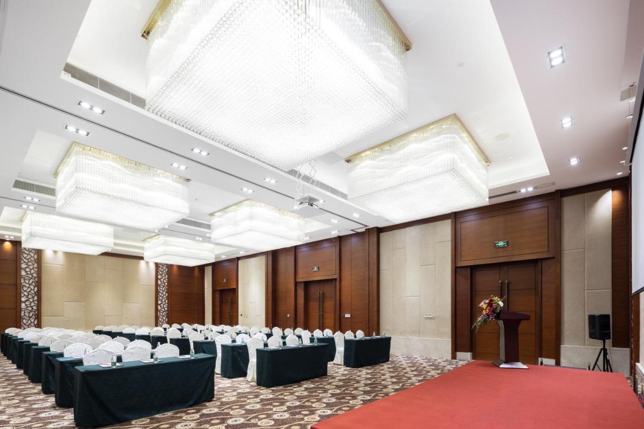 Sanya Seacube Holiday Hotel Bagian luar foto