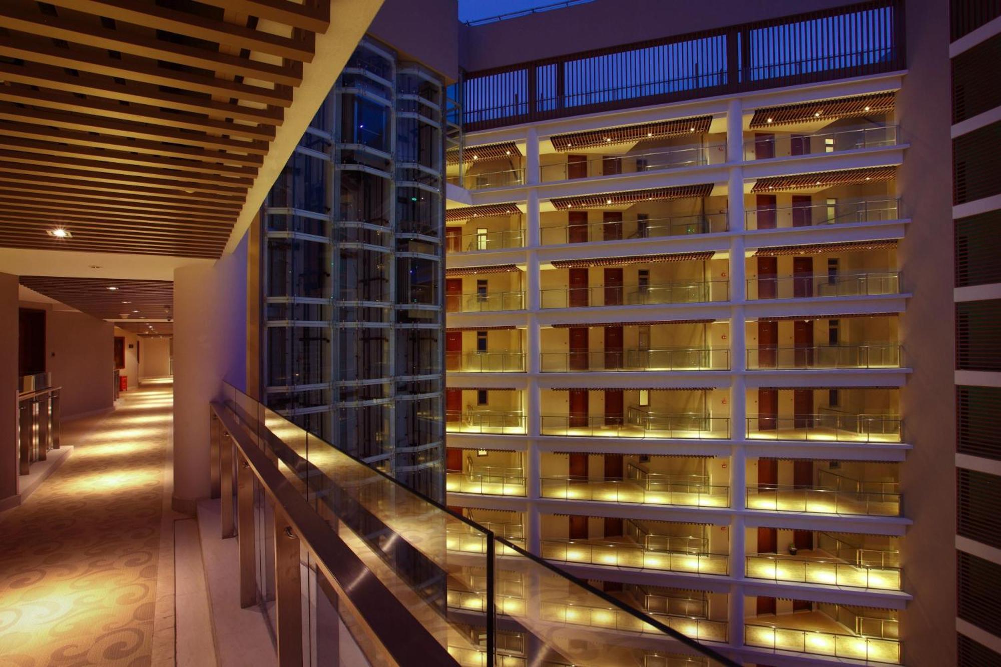 Sanya Seacube Holiday Hotel Bagian luar foto