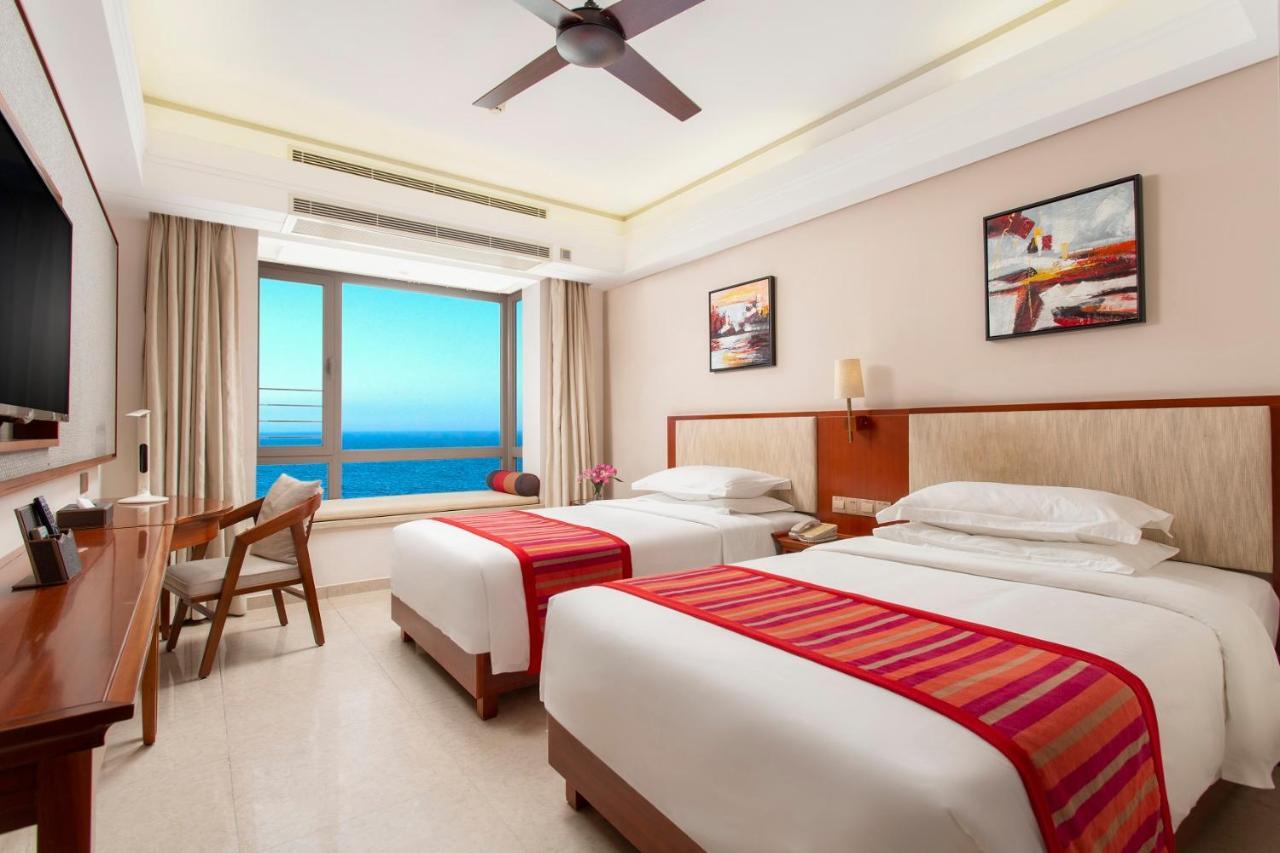 Sanya Seacube Holiday Hotel Bagian luar foto