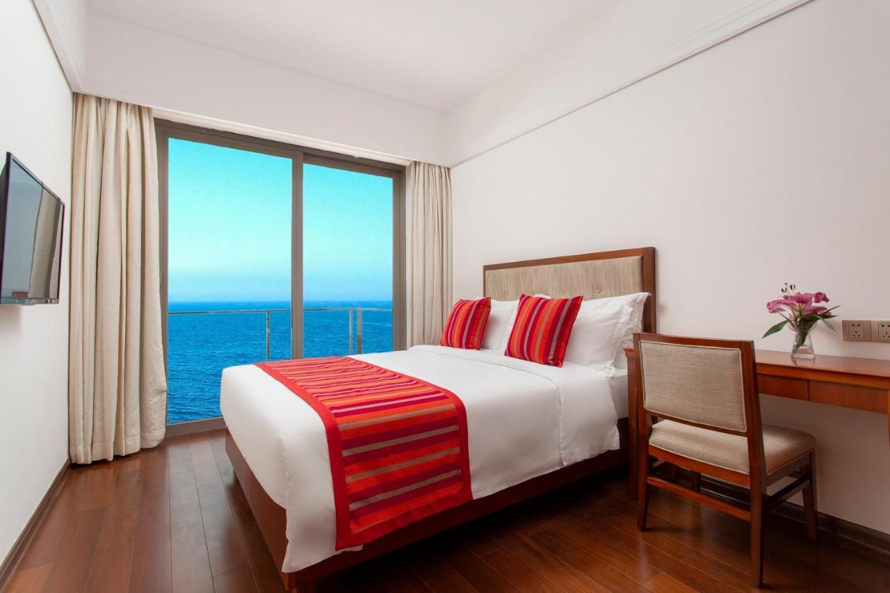 Sanya Seacube Holiday Hotel Bagian luar foto