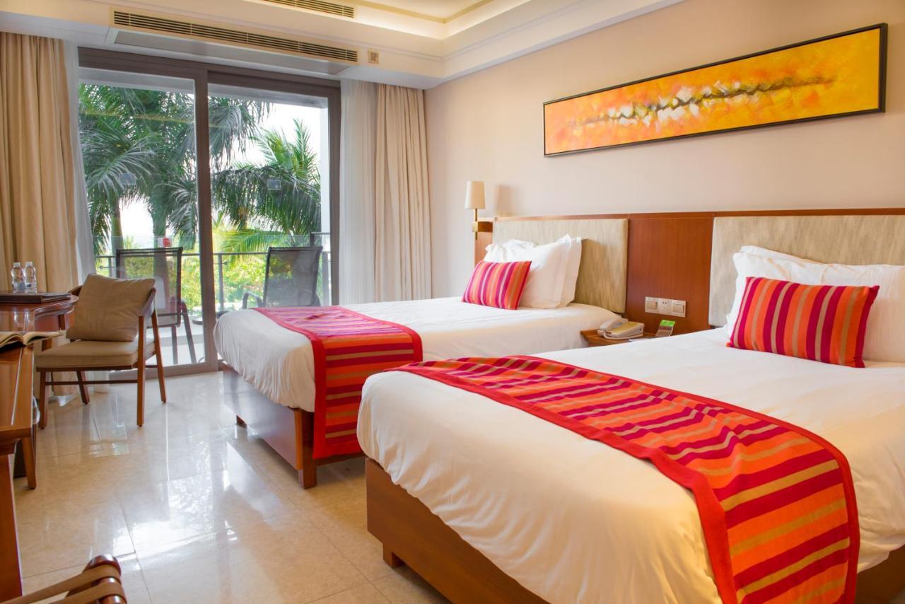 Sanya Seacube Holiday Hotel Bagian luar foto